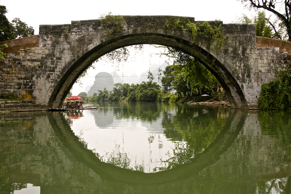The 600 year old Dragon Bridge on the Yulong River, Yangshuo, Guangxi, China