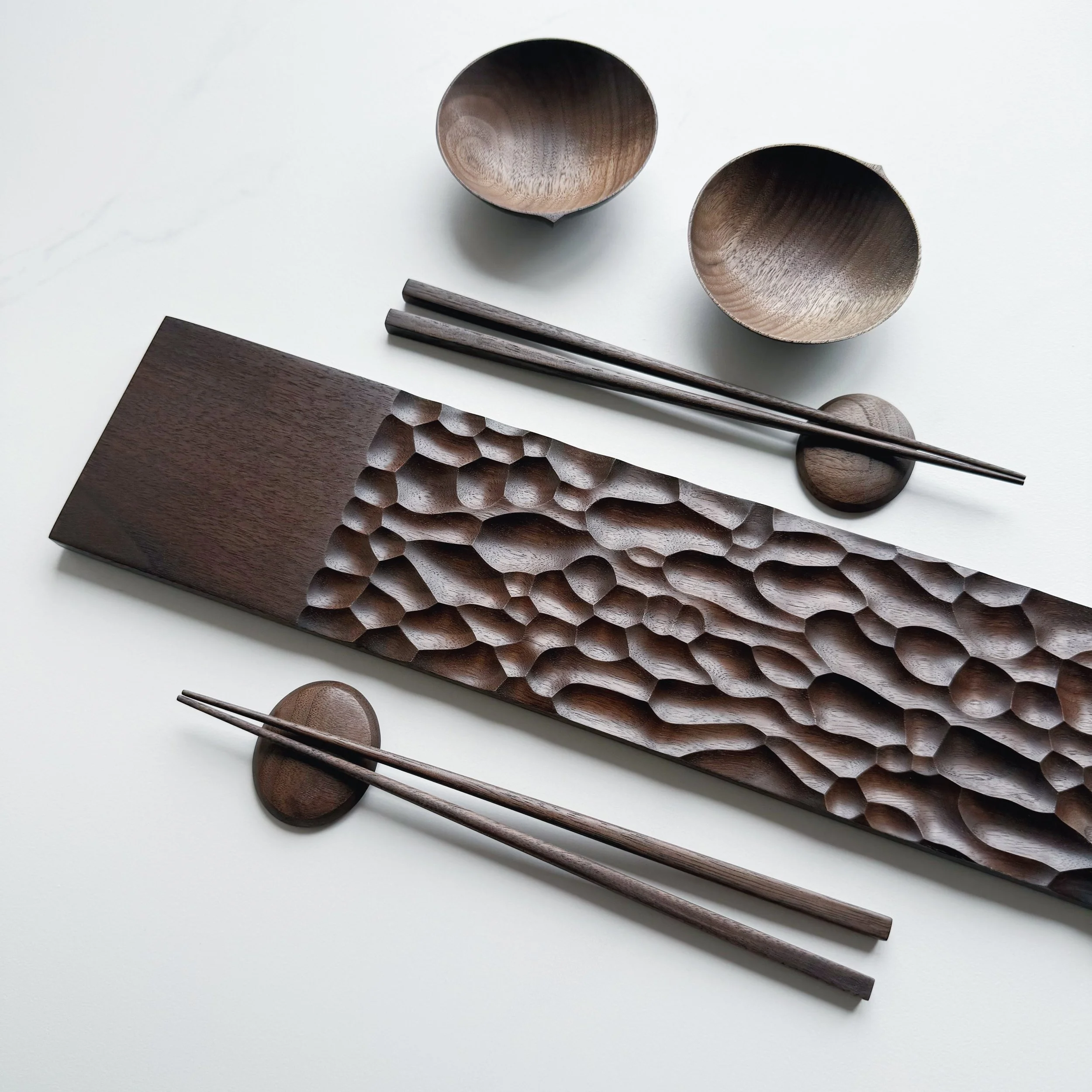 Long presentation board set in black walnut - three