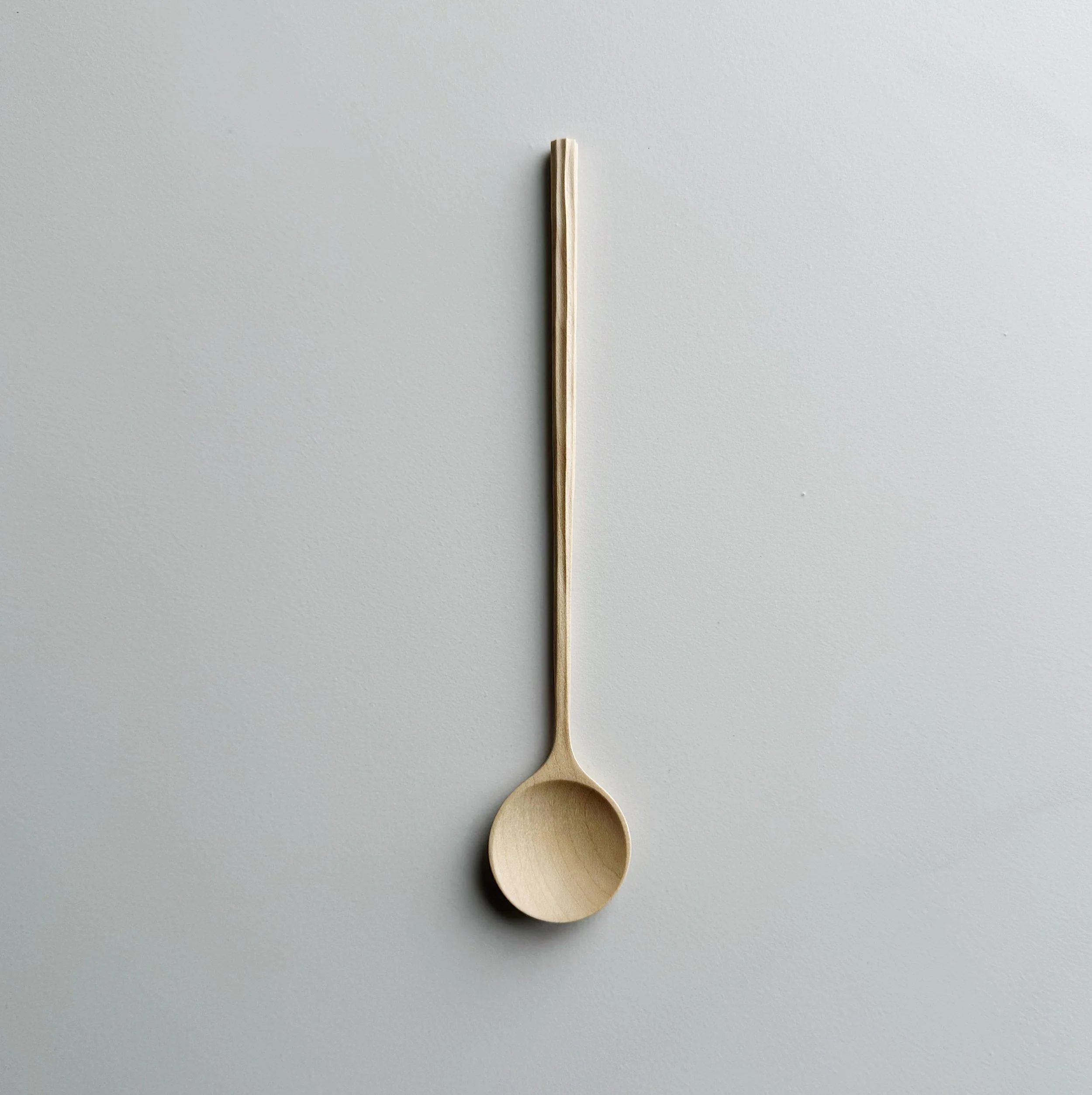 Sculpted handle eating spoon in sycamore