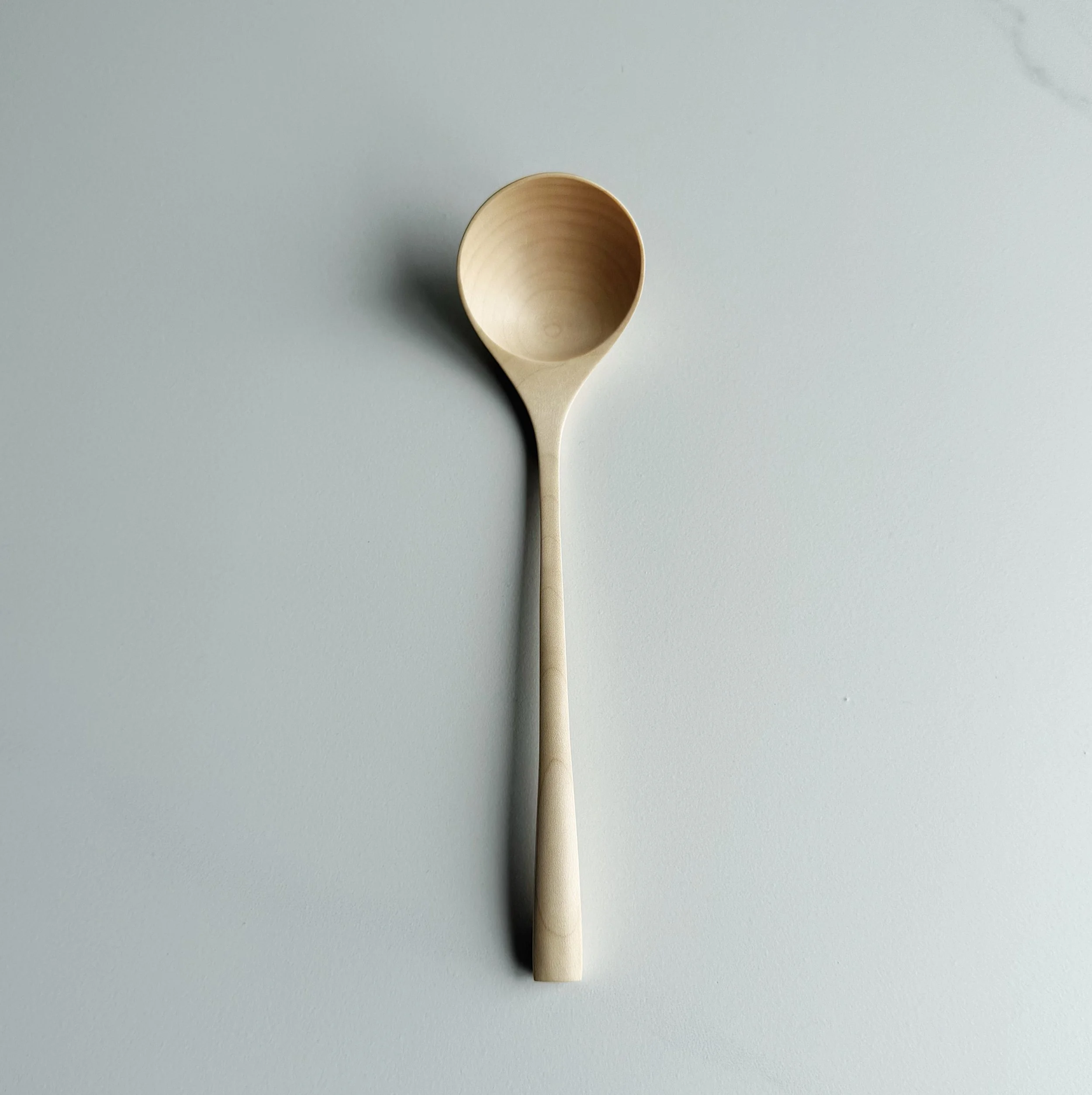 Ladle style eating spoon in sycamore