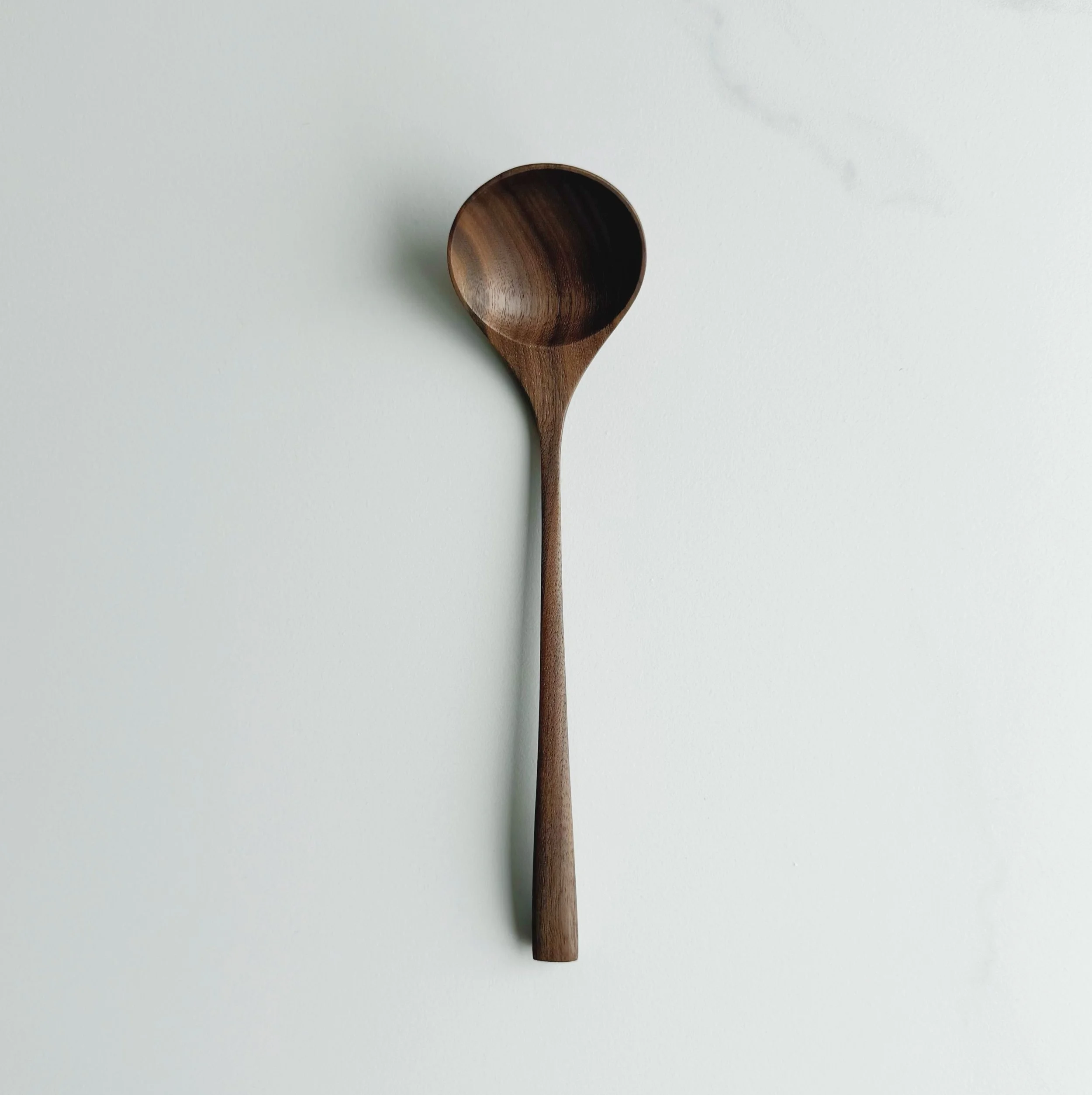 Ladle style eating spoon in tanned walnut