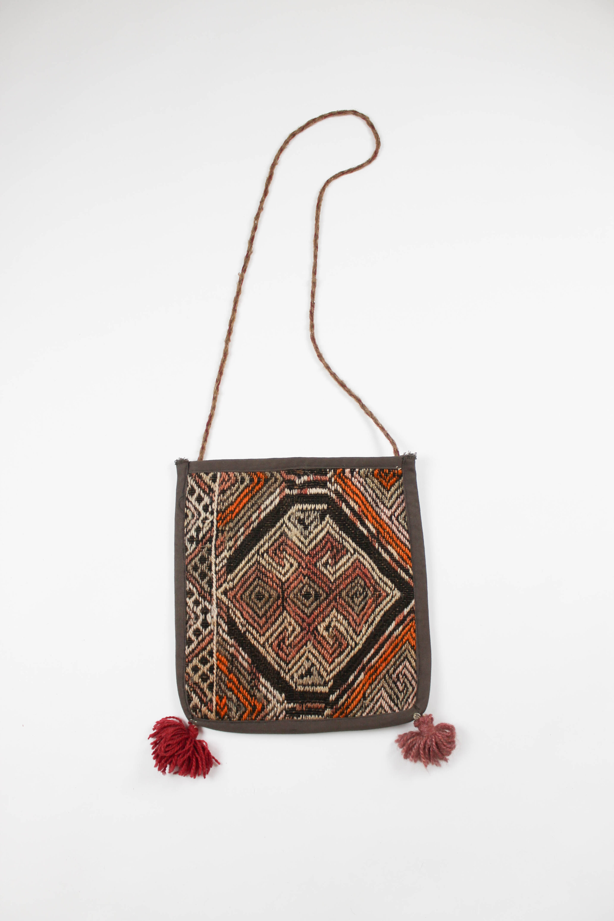WOOL WOVEN BAG WITH TASSELS - $32