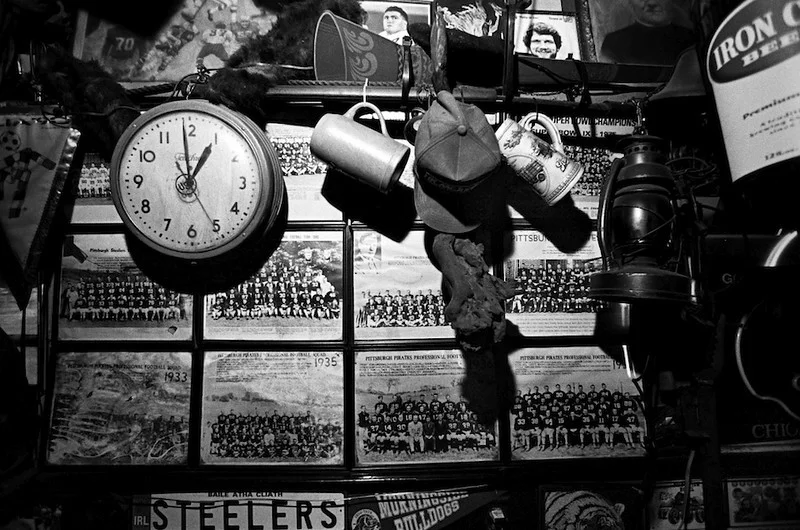      

 
  Memorabilia and photographs cover the walls of Chiodo’s Tavern. Homestead, PA 2004. [07_89060029.]
 






















     