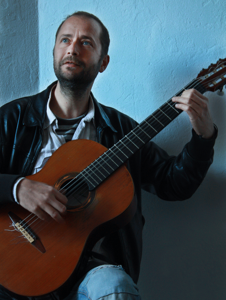 Hombre con la guitarra