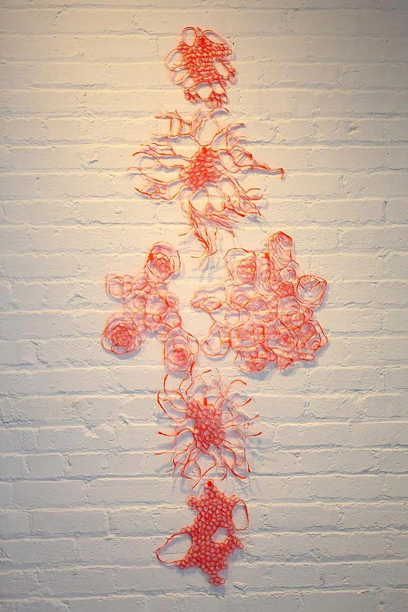 Neon Spider , 2012, paper, 50 x 30 x .25 in.