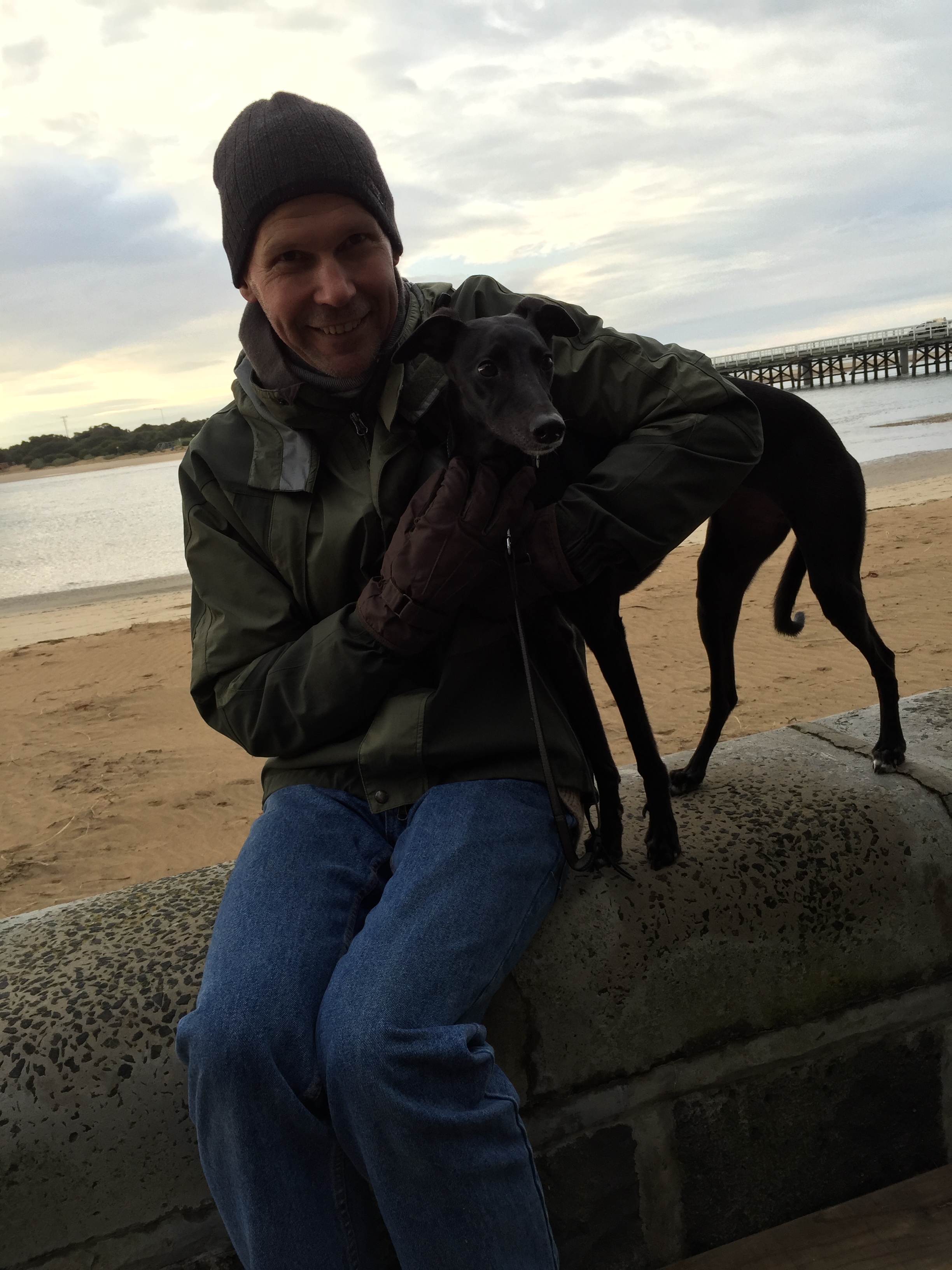 First sea breeze. First time balancing on a sea wall. First beachy photo. 
