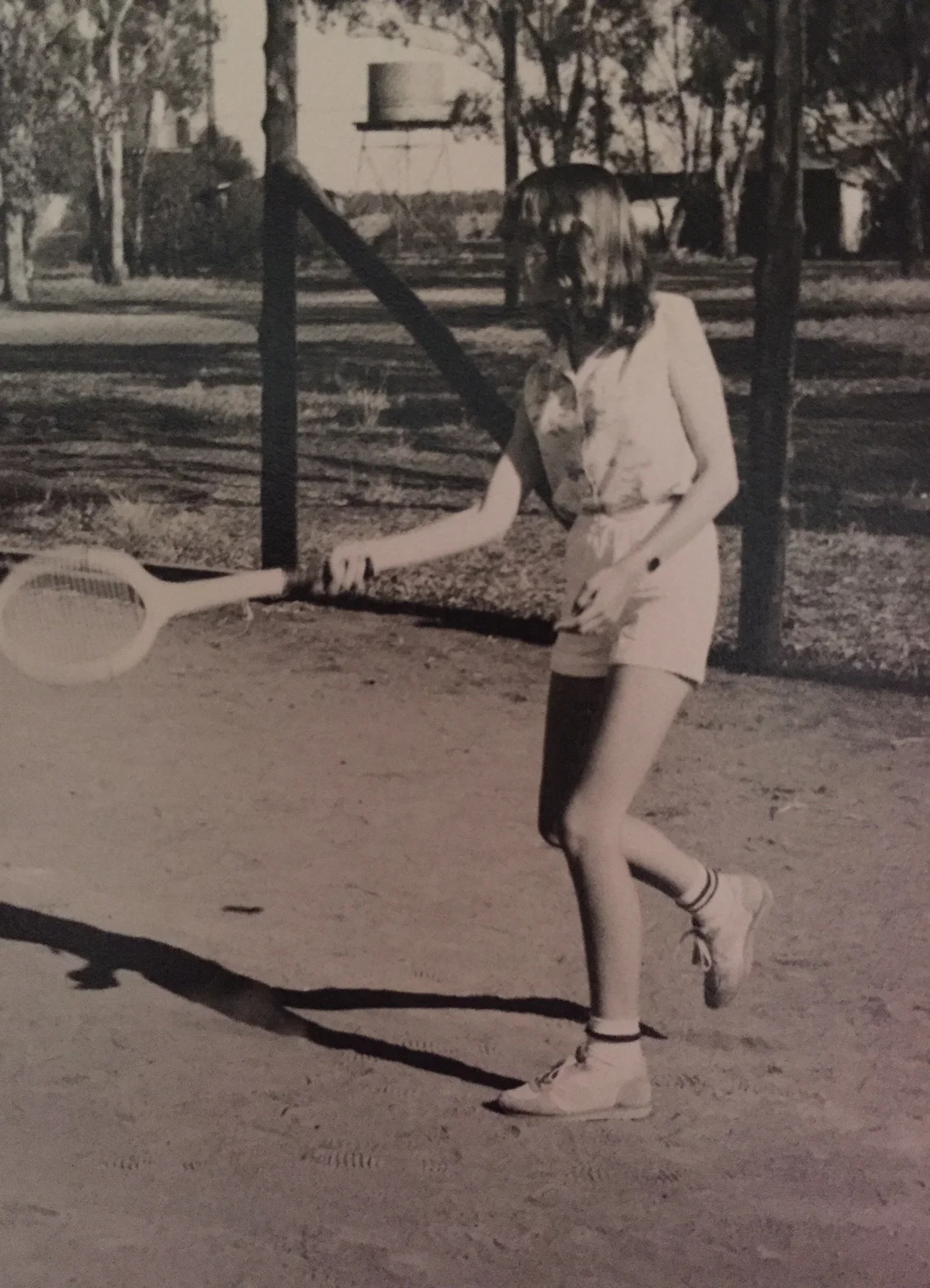 Me at a church tennis outing. I look unenthusiastic, I know, but those old wooden racquets were incredibly small which made ball-contact almost impossible. The sponge cake at afternoon tea, however, was large and delicious and had my total dedication.