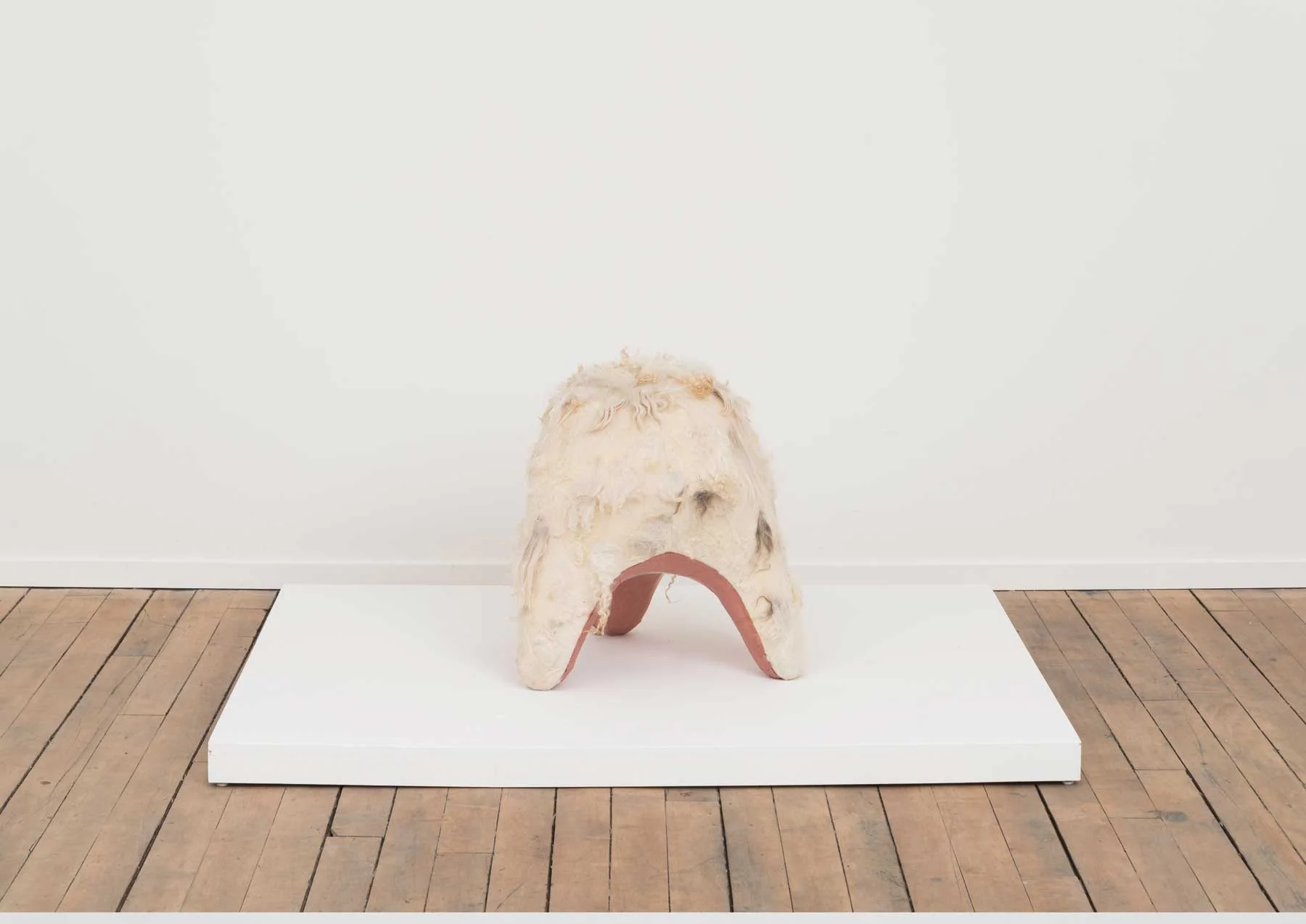 Swaddle Stool (Underbelly) , 2015 Self-drying terra-cotta, canvas, wool 19 x 19 x 20 inches Image courtesy of Volume Gallery, Chicago, IL