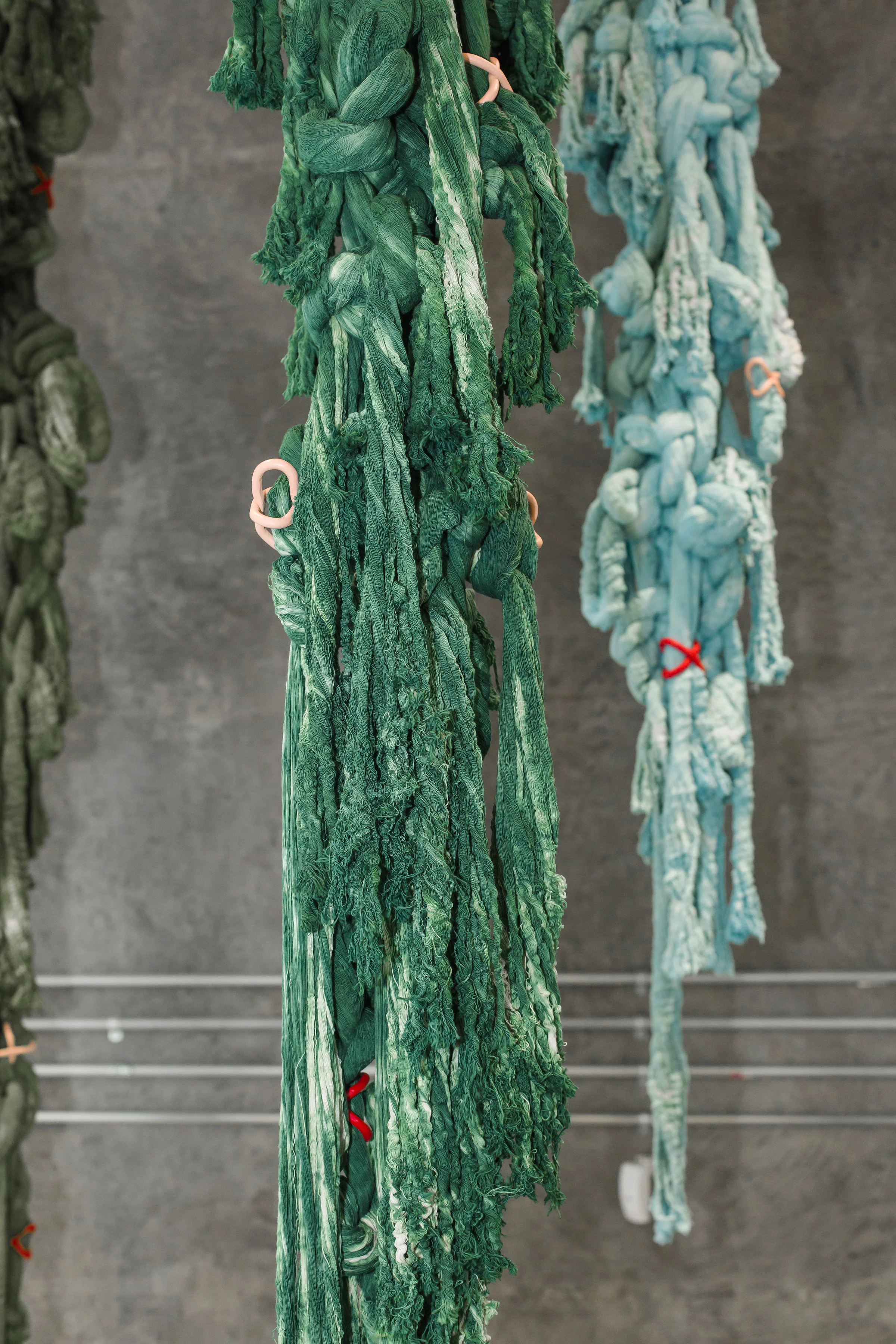 Manglar, 2017 Unraveled and hand-dyed cotton, hand-painted resin clay