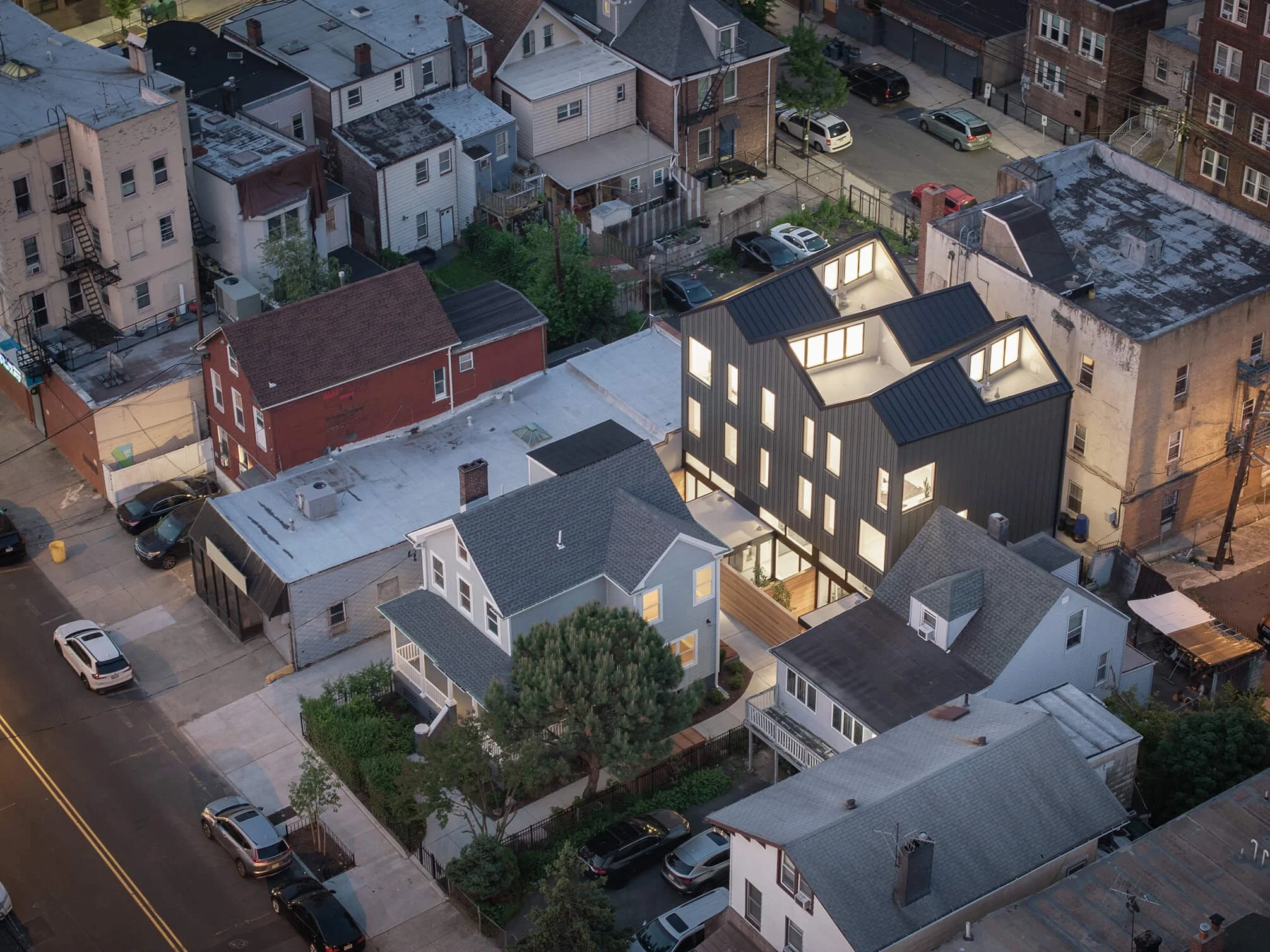 Aerial view of YIMBY House residential project in Jersey City by Behin Ha Studio showing building context within the surrounding urban fabric.