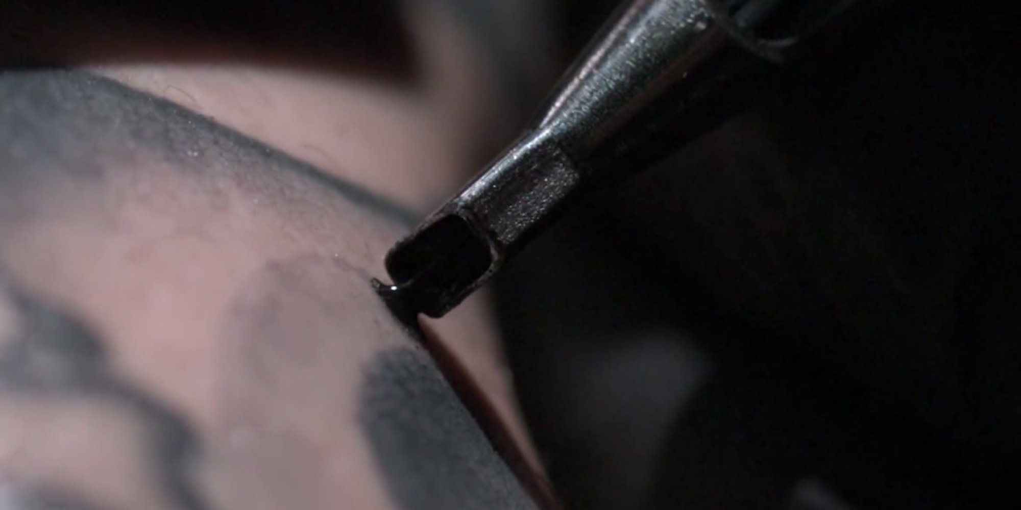 o-TATTOOING-CLOSE-UP-IN-SLOW-MOTION-facebook.jpg