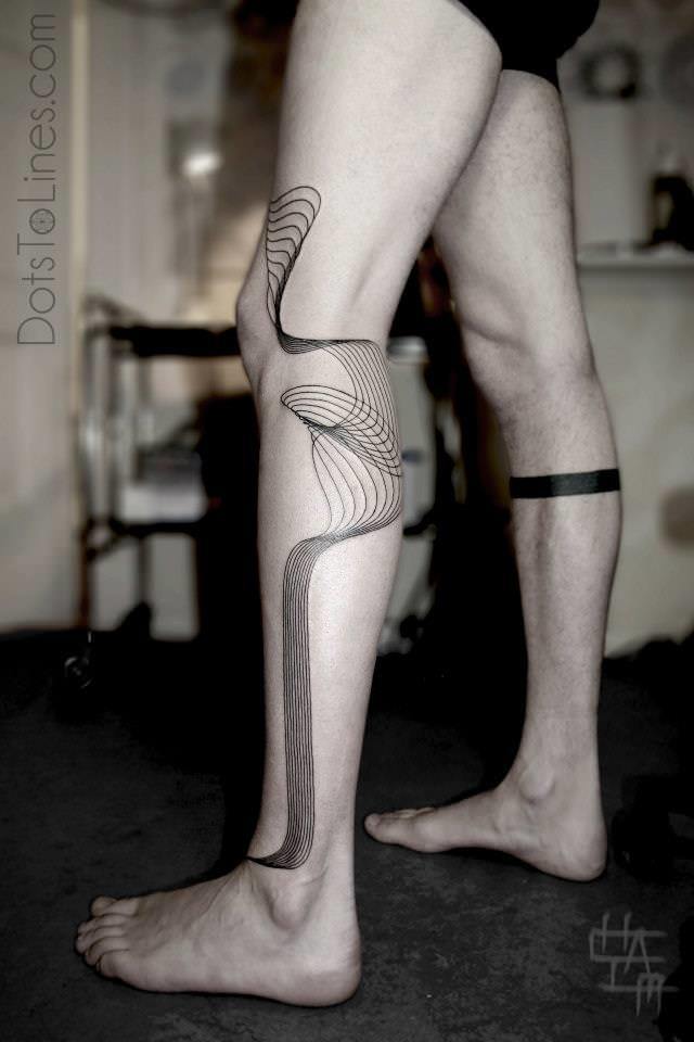 Geometric-patterns-become-an-unusual-math-tattoos-in-this-leg-tattoo-by-Chaim-Machlev.jpg