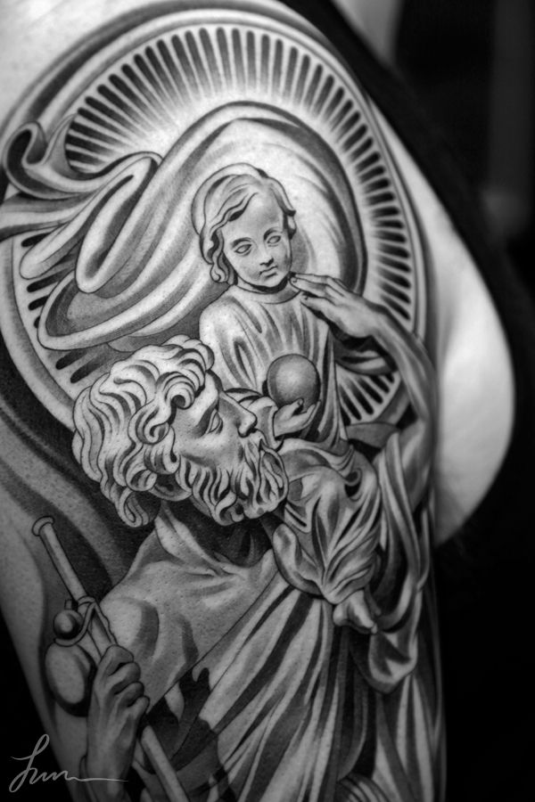 Black-And-Grey-Saint-Christopher-Tattoo-Design-For-Shoulder-By-Juncha.jpg