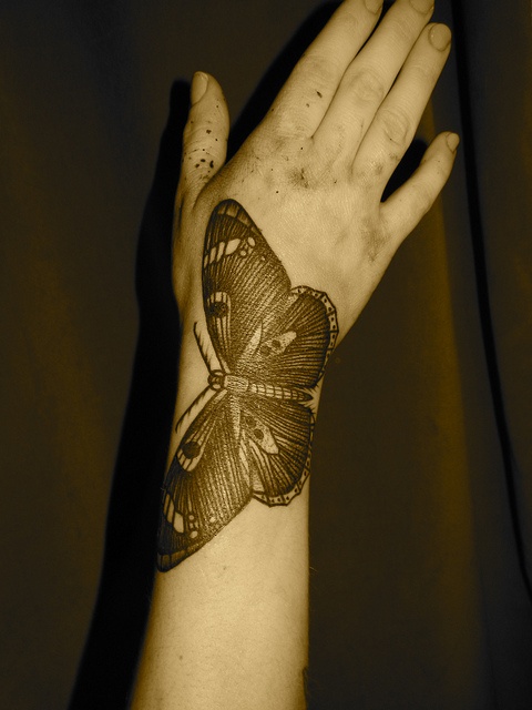 liam-sparkes-tattoo-butterfly-on-arm-and-hand.jpg