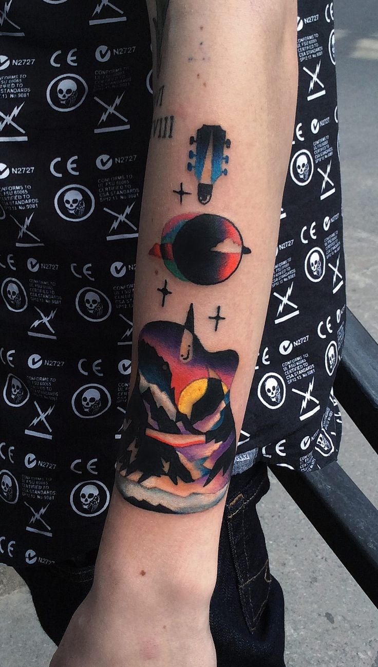 abstract-landscape-tattoo-on-arm-by-david-côte.jpg