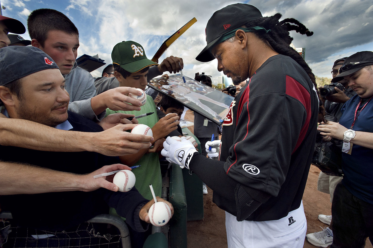  The River Cats' left fielder Manny Ramirez (11) signs autographs briefly&nbsp; prior to the game between the Sacramento River Cats and the Reno Aces at Raley Field in West Sacramento on Friday, May 25, 2012. 