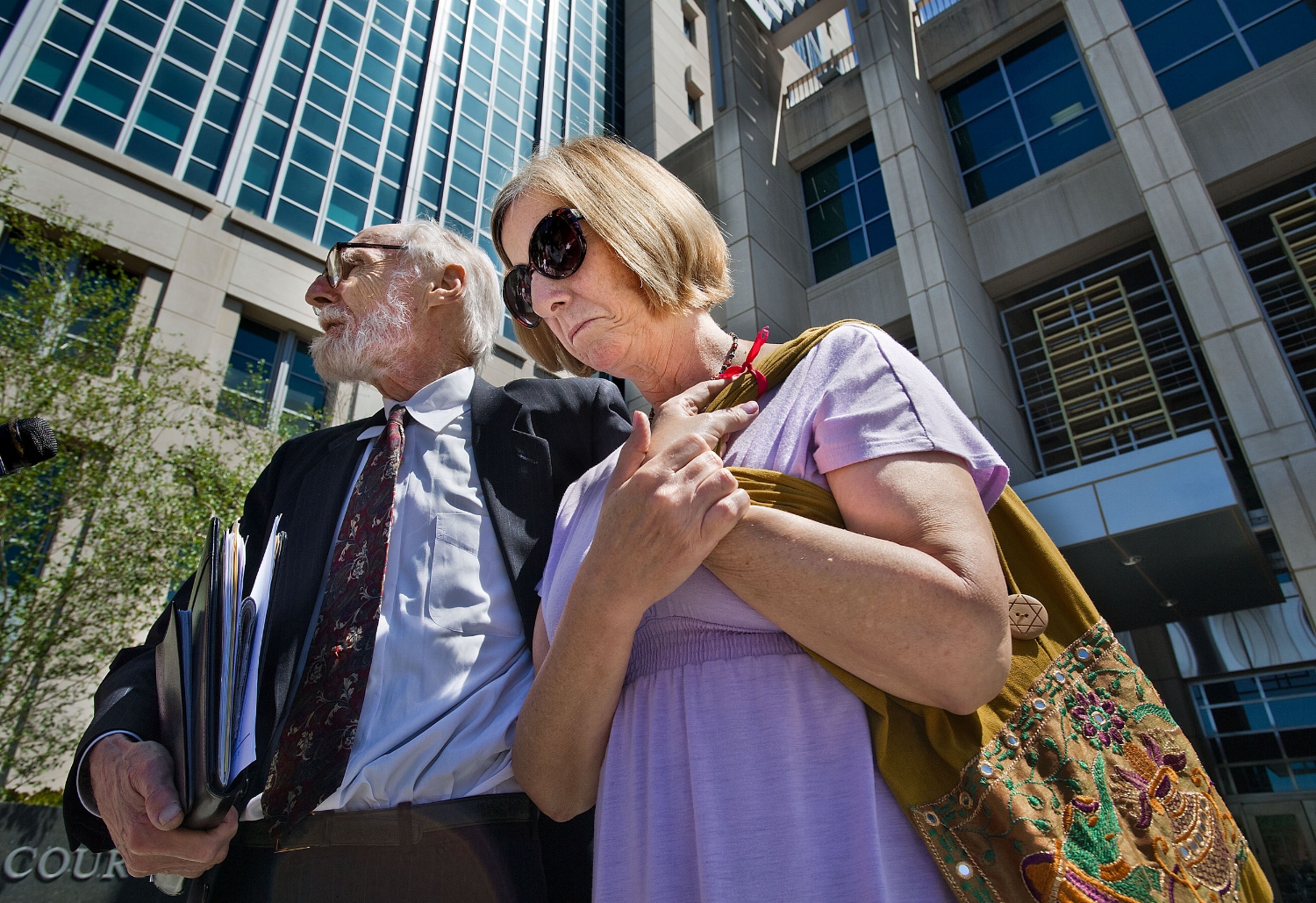  Anti-war activist Cindy Sheehan, right, with her attorney Dennis Cunningham outside the Federal Courthouse in Sacramento on Thursday, April 19, 2012. 