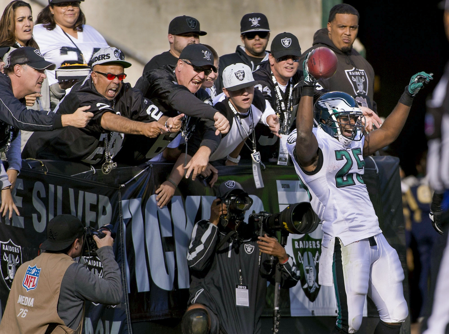 Raiders fans jeer as Eagles running back LeSean McCoy (25) celebrates a touchdown during the game between the Oakland Raiders and the Philadelphia Eagles at O.co Coliseum in Oakland on Sunday, November 3, 2013. 