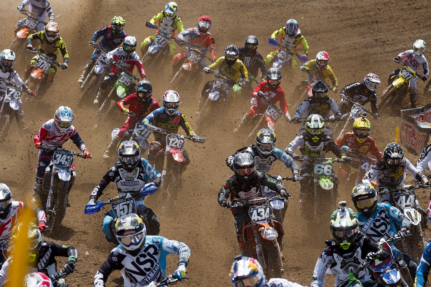  Riders race through the dirt in the first 250 moto during the annual Hangtown Motocross Classic motocross event at Prairie City SRVA in Rancho Cordova on Saturday, May 16, 2015. 