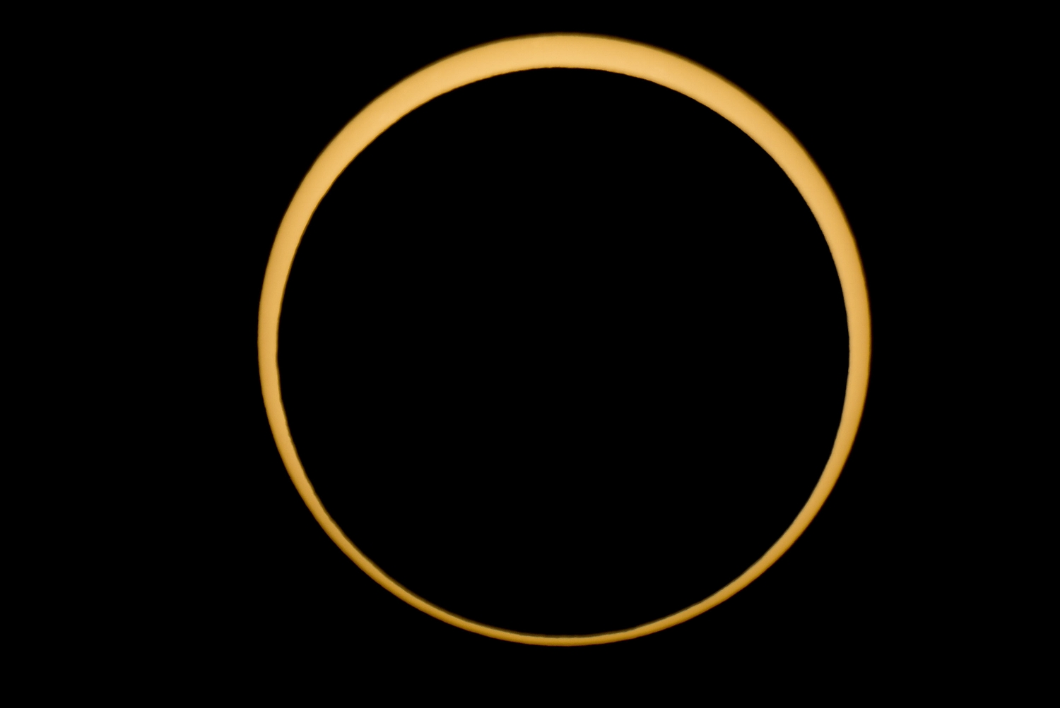  The moon is silhouetted against the sun in this annular solar eclipse near McCloud, CA&nbsp; on Sunday, May 20, 2012. Unlike a total solar eclipse, the sun is not completely obscured due to the moon's greater distance from the earth. 