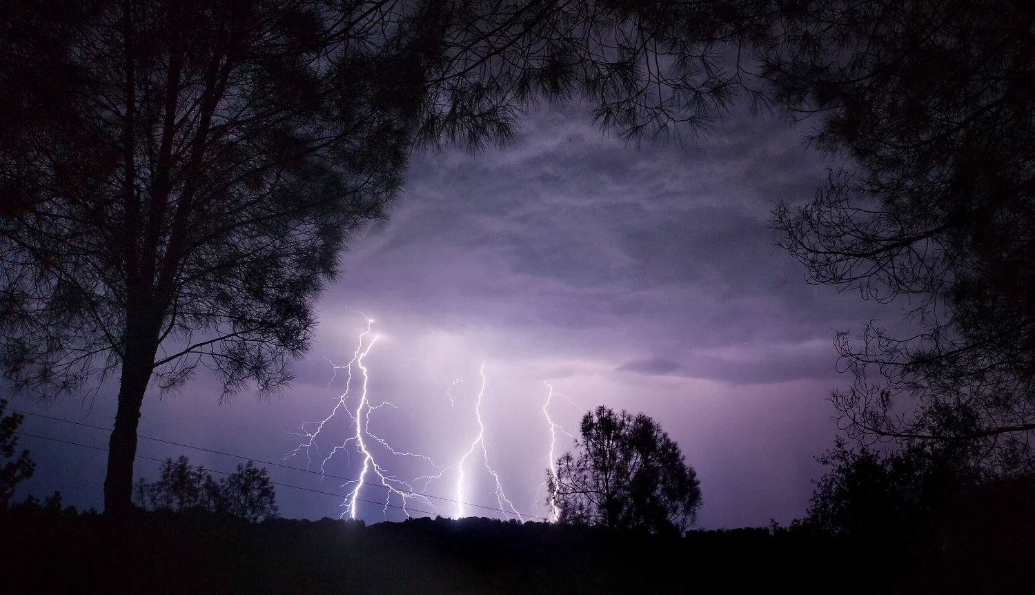 Lightning cracks through the sky over El Dorado in the early morning of Monday, July 23, 2012.