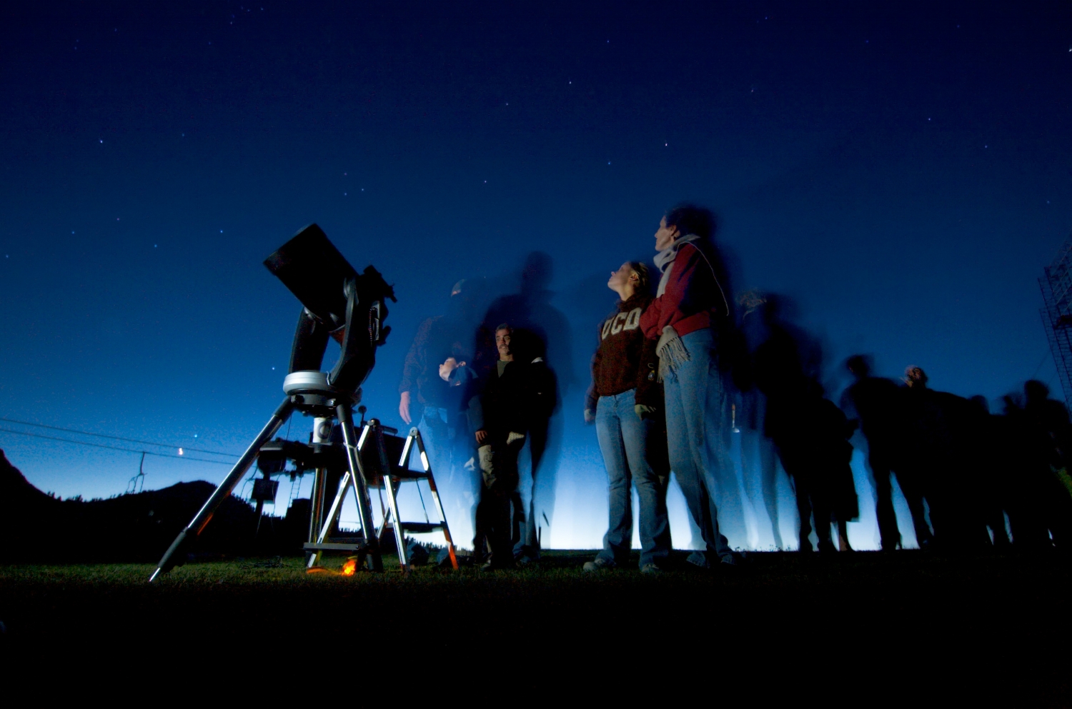  Visitors line up to look through a telescope at Squaw Valley Resort on Friday July 13, 2007. 