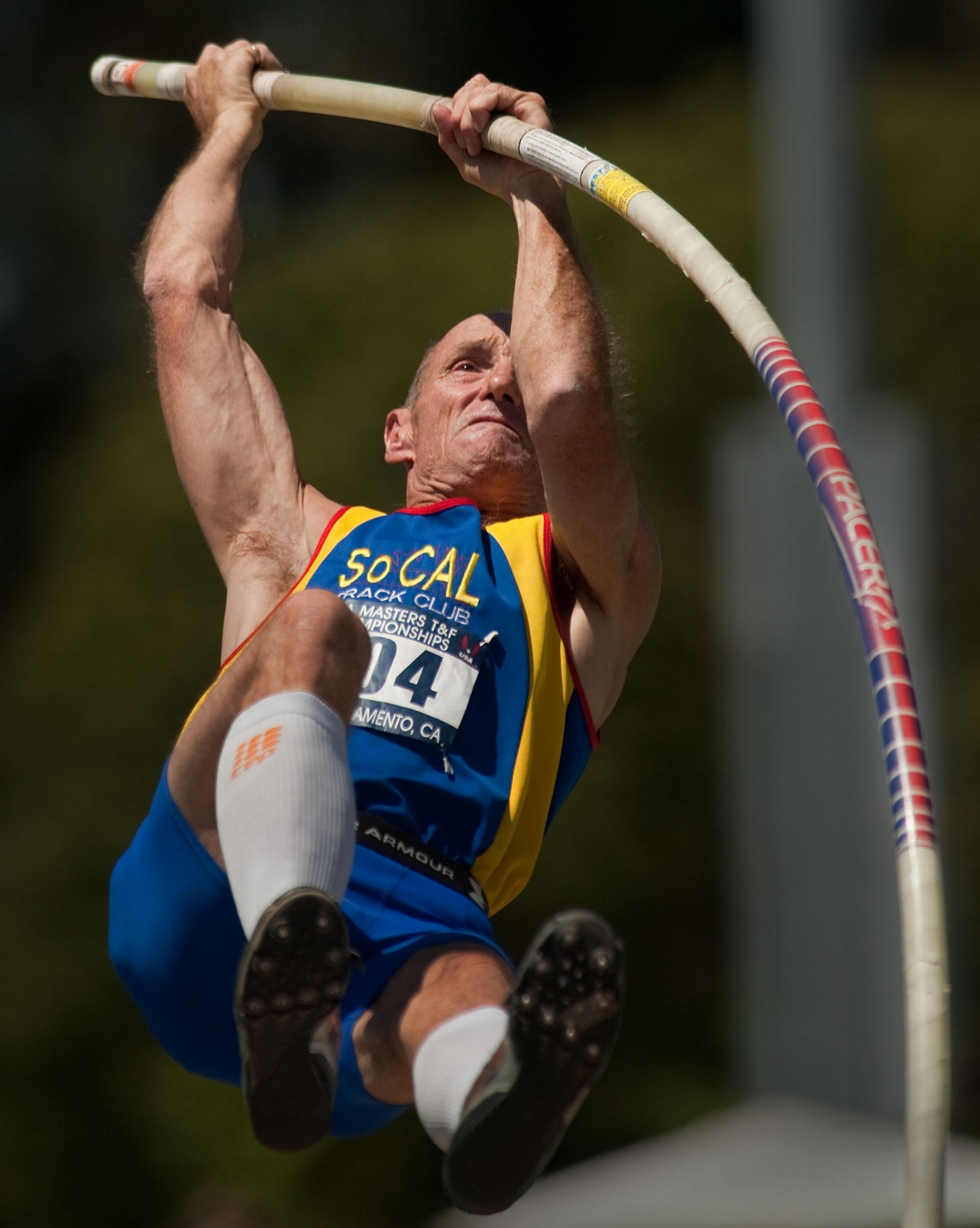  Kirk Bentz 55 competes in the pole vault during the Masters Track and Field championship at Sac State in Sacramento on Saturday, July 24, 2010. Bentz finished second with a vault of 12' 11.5". 