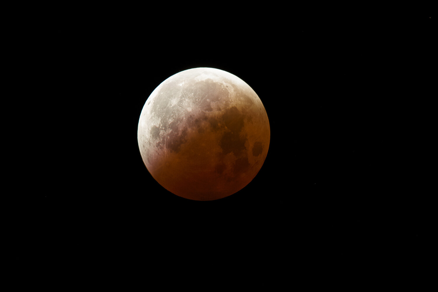  A Partial lunar eclipse seen from El Dorado, Calif., at 4:46 am Wednesday, October 8, 2014.  