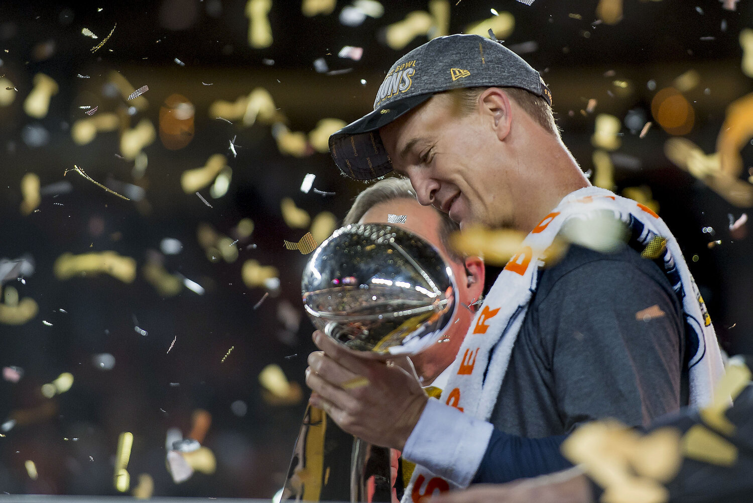  Denver Broncos quarterback Peyton Manning holds the Lombardi Trophy  following Super Bowl 50 on Sunday, Feb. 7, 2016 at Levi's Stadium in Santa Clara, Calif. The Broncos won the game 24-10. 