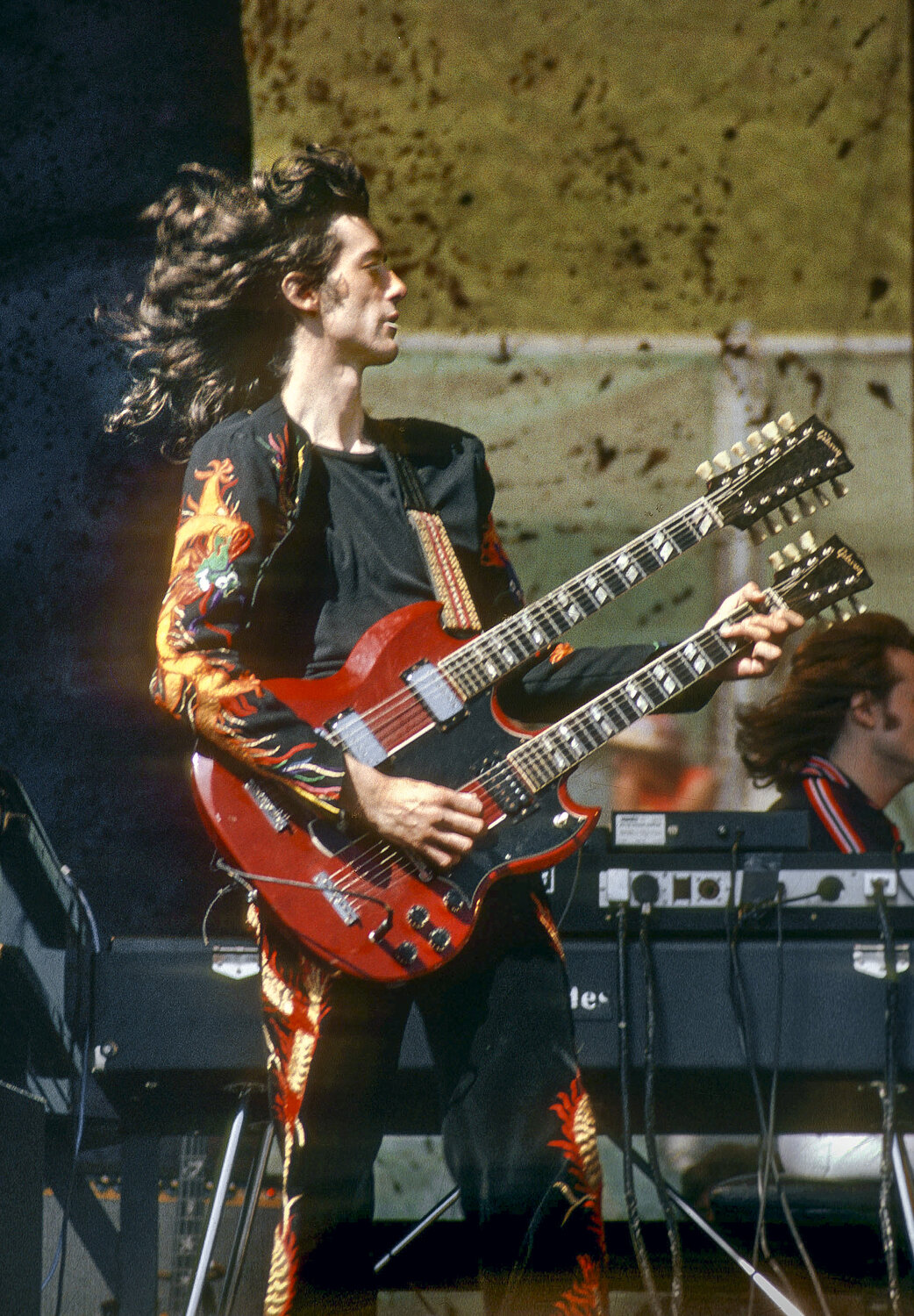  Jimmy Page of Led Zeppelin performs at the Oakland Coliseum July 23, 1977. 