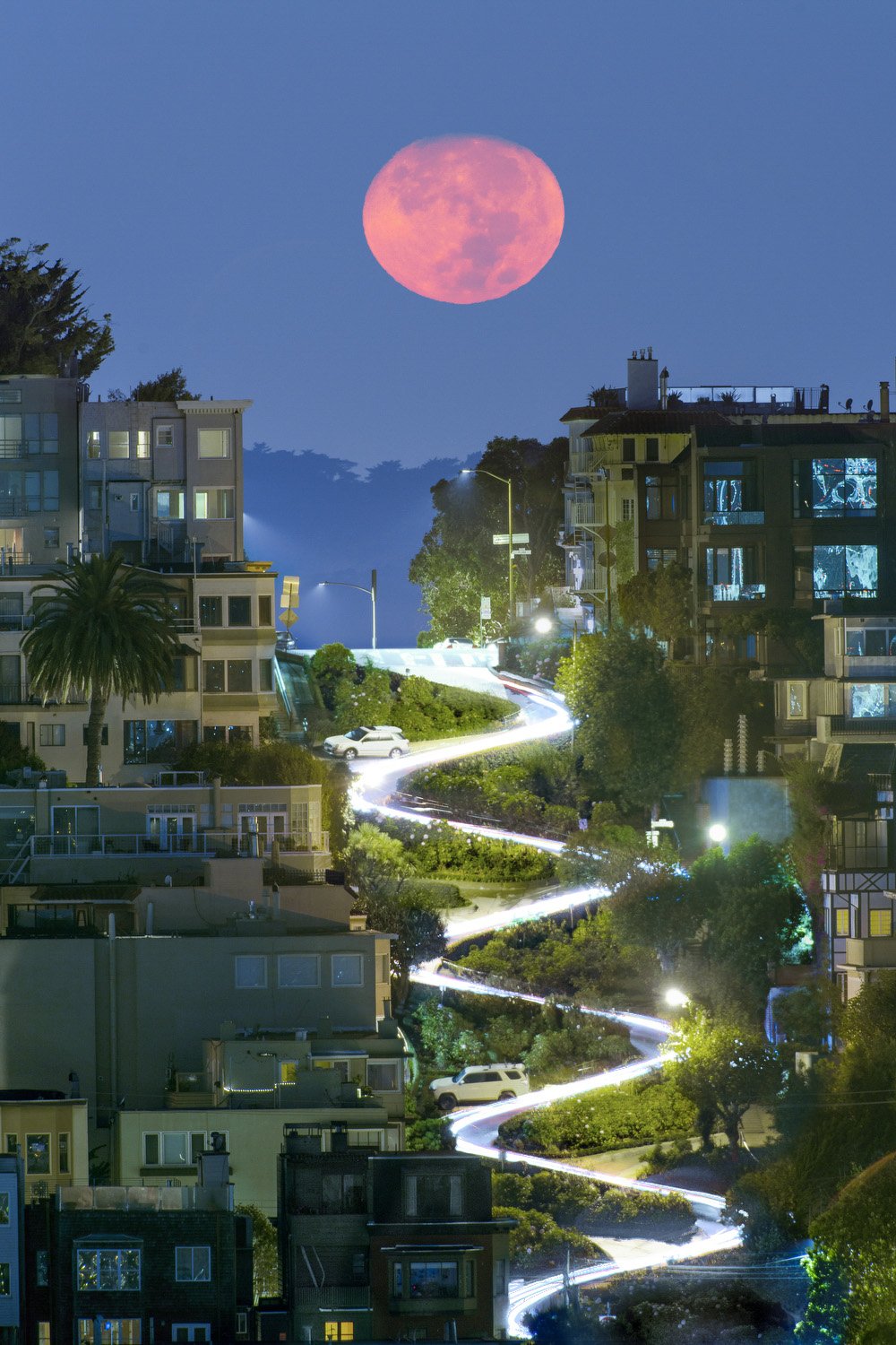  Car headlights illuminate Lombard Street in San Francisco, Calif. 4:41 am, Thursday, Oct. 29, 2020. The famous winding section of road claims to be “the crookedest street in the world.” 