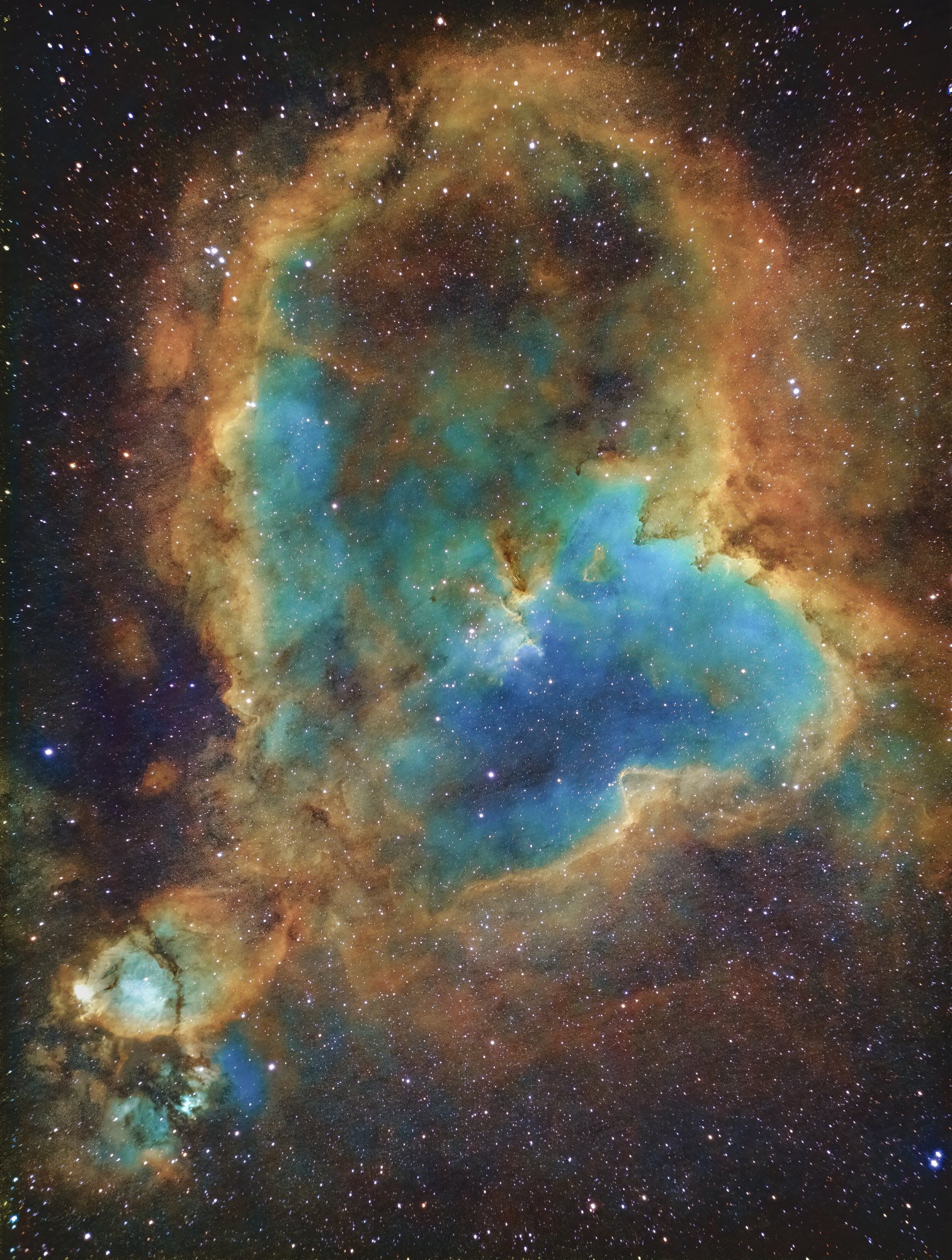  The Heart Nebula, also known as IC 1805, is  approximately 7,500 light years from Earth and is approximately 200 light years across. It is a cloud of ionized hydrogen, oxygen, and sulphur gasses, and is a part of our own Milky Way galaxy. (William O