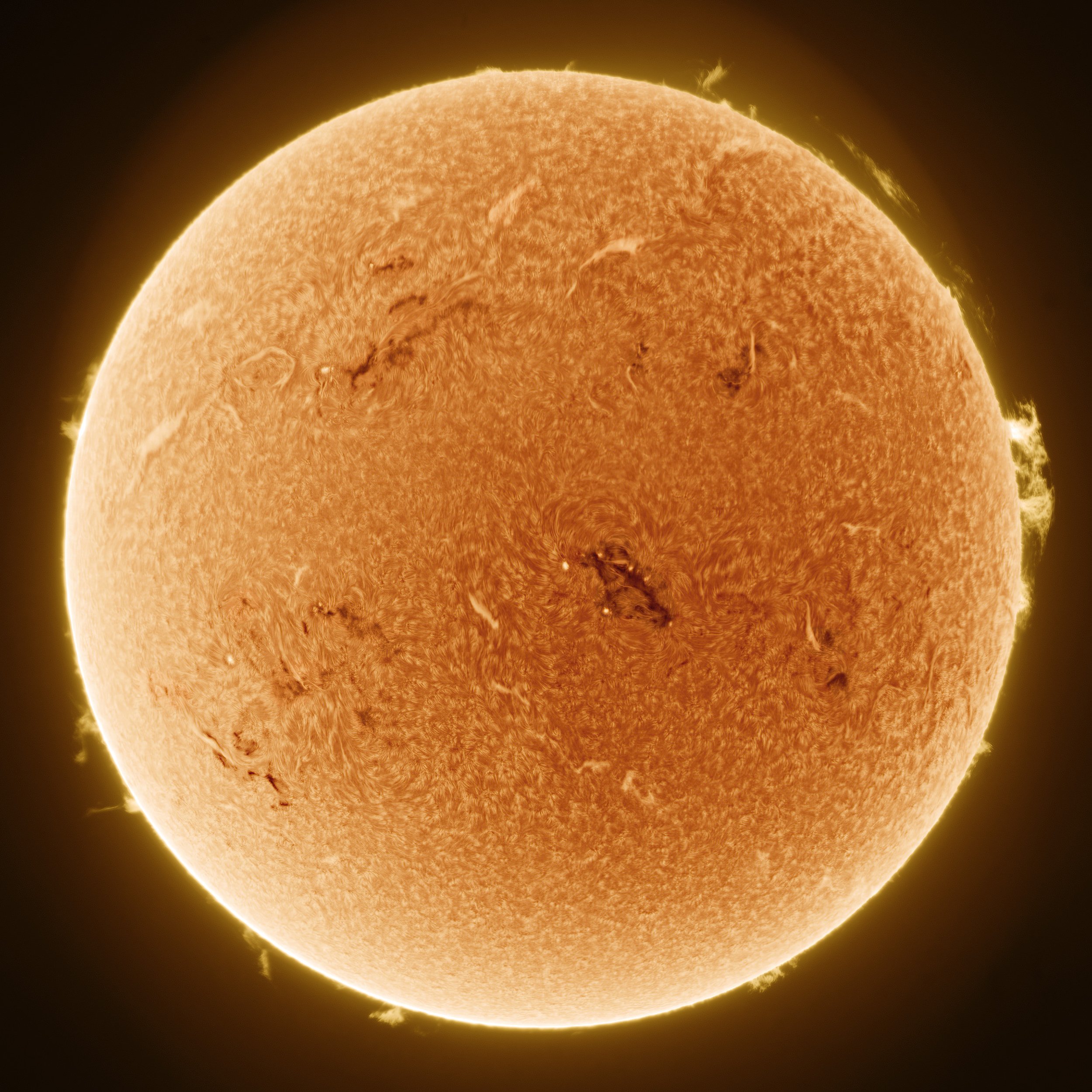  The Sun’s chromosphere in Hydrogen alpha light. This image was taken with a telescope equipped with a special filter (etalon) that only passes light from Hydrogen. These details would otherwise be lost due to the intense brightness of the underlying