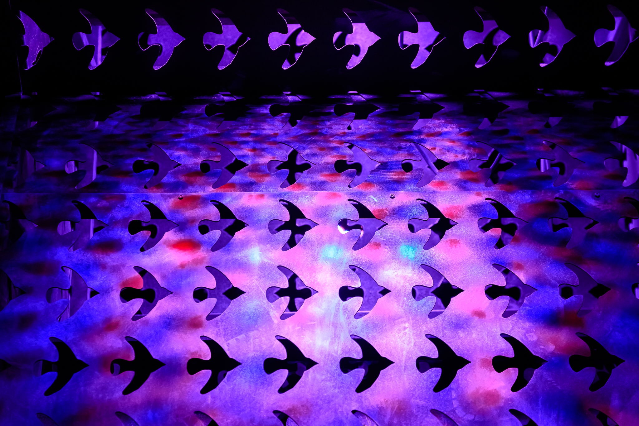 OK. Laser cut doves provide negative space on the "OK", "LIVE", "BE", and "DREAM" sculptures.