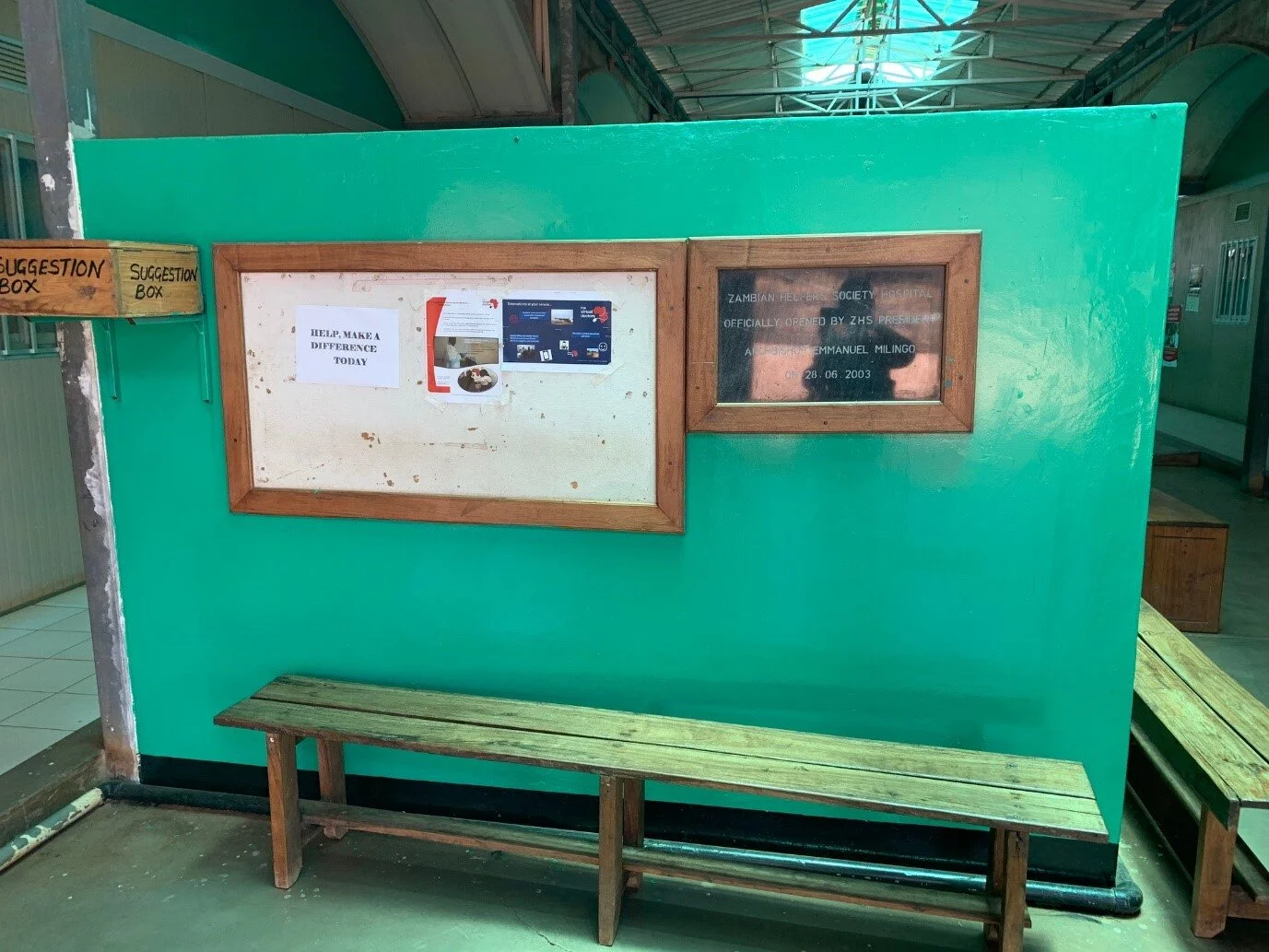 Zambia Helpers Society Hospital: reception area with a VDrs poster