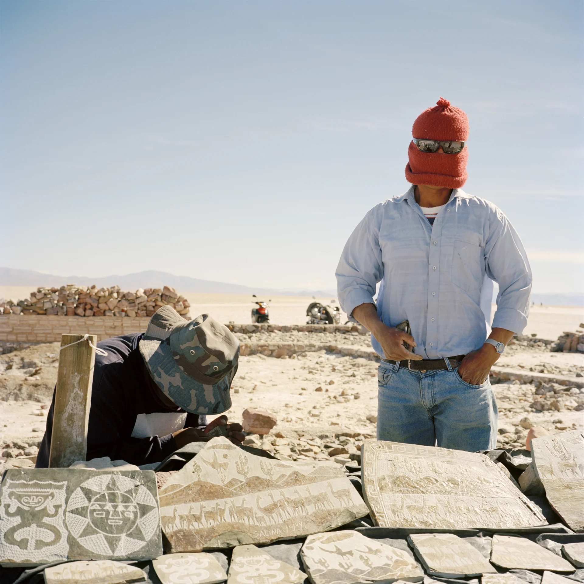 Jujuy Province. Salinas Grande is the biggest salt flat in Argentina, 60 kms in length and covering an area roughly 5200km2, at an altitude of 3350 meters. Salt is harvested from square pools dug into the crystalline salt plain. Souvenir sellers.