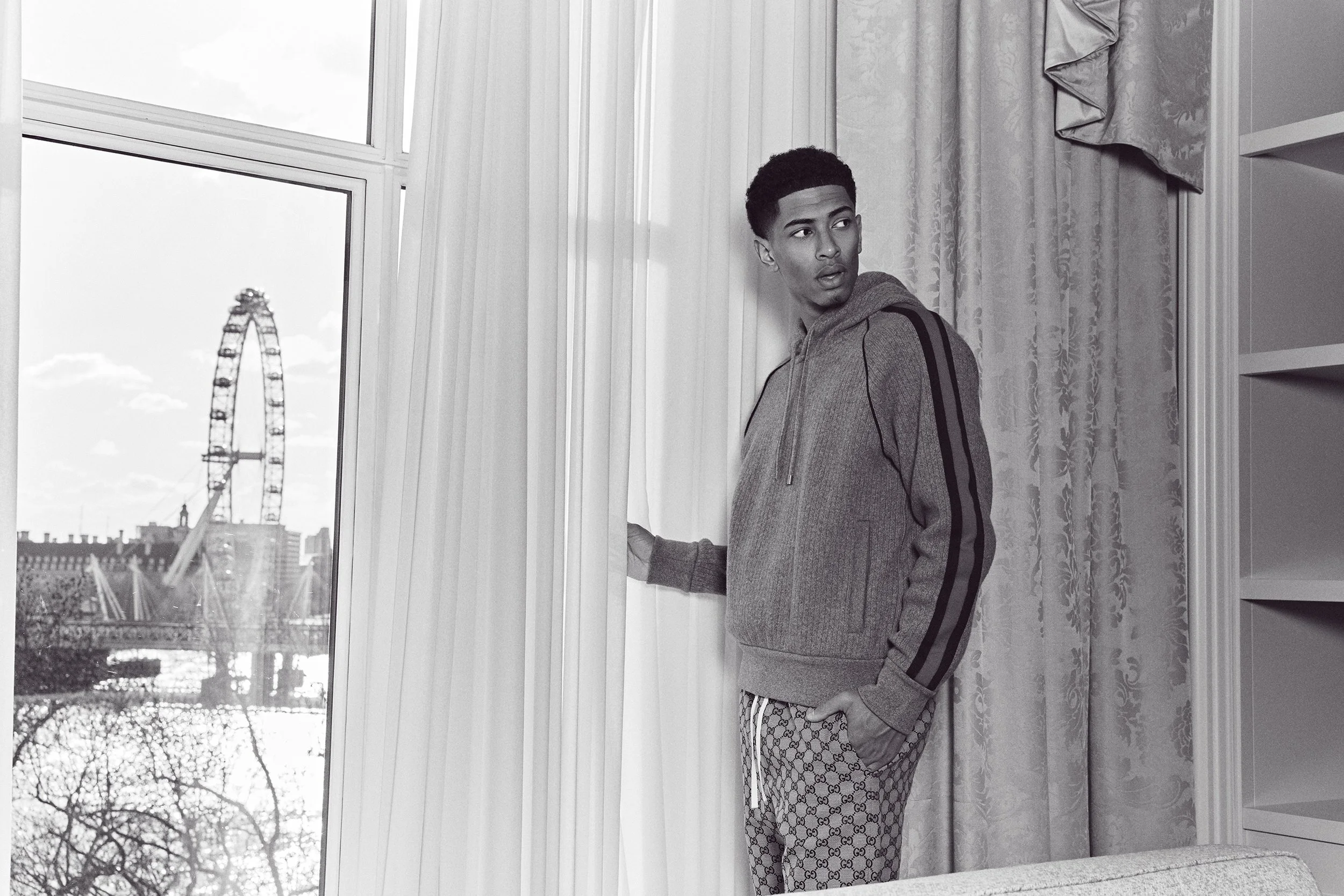 Jude Bellingham at the Savoy hotel, looking out over the London Eye