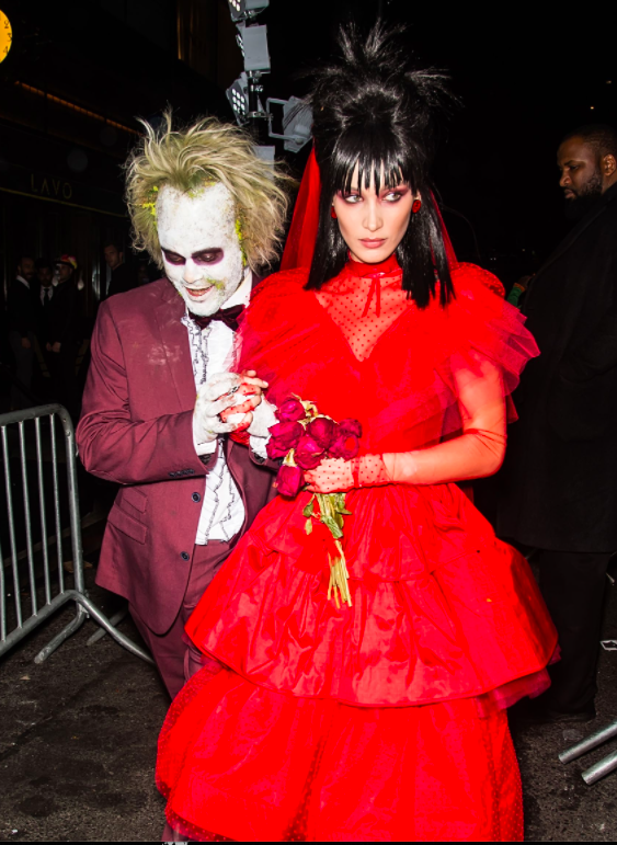 The Weeknd and Bella Hadid as Beetlejuice and Lydia.