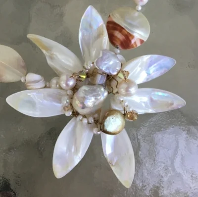 Tidal flower lei, with baroque pearls, crystals, tiger nautilus, etc. etc.