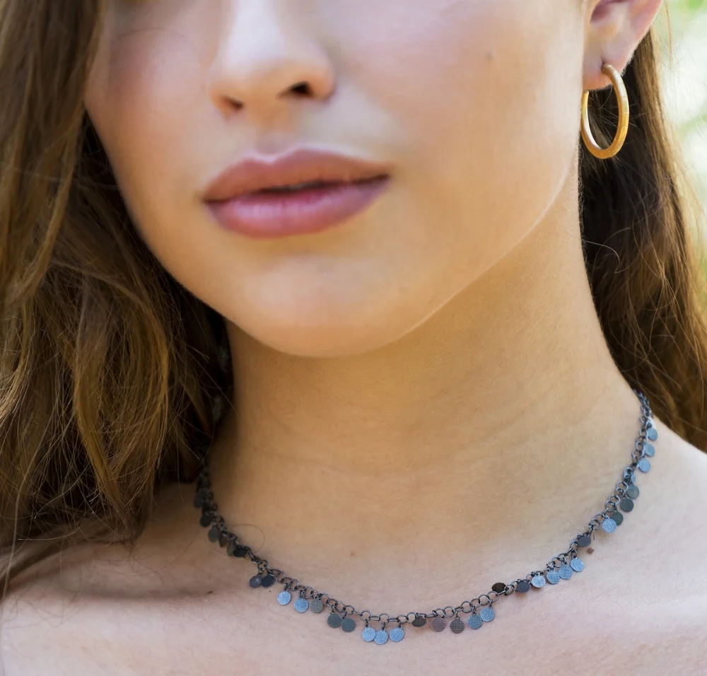 Large Vermeil Stamped Hoop Earrings on model (Copy)