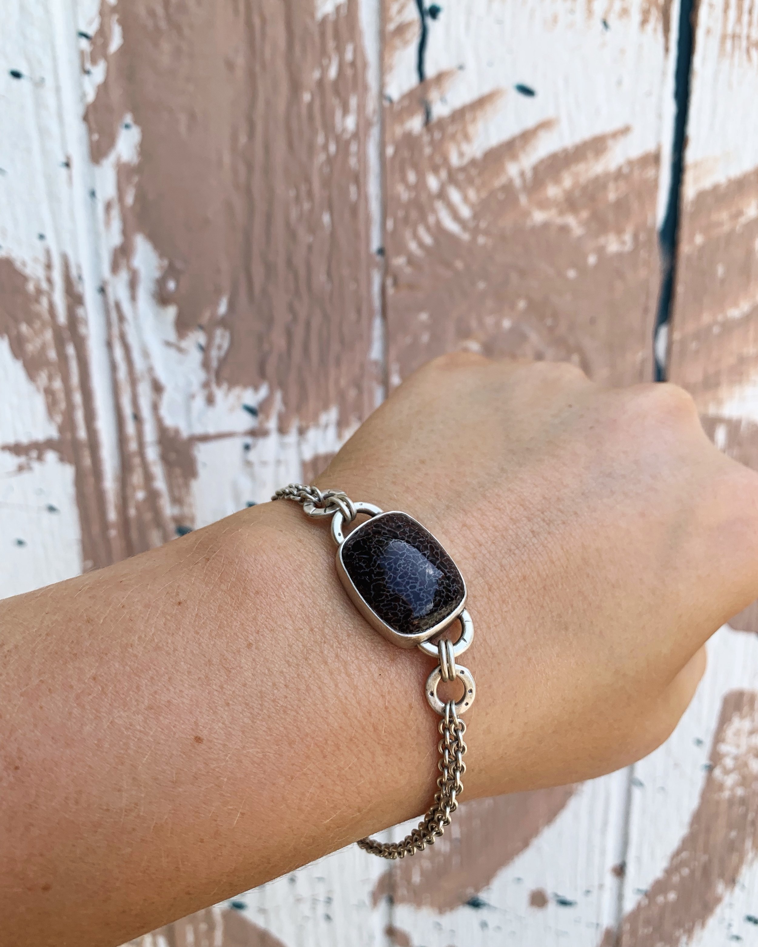 Fossilized Dinosaur Bone bracelet on model