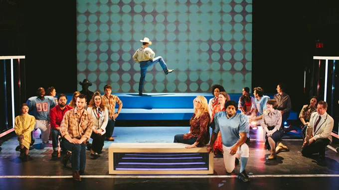 The cast of "Bum Phillips: All-American Opera" in The Ellen Stewart Theater at La MaMa in NYC, 2014. Photo by Corey Torpie