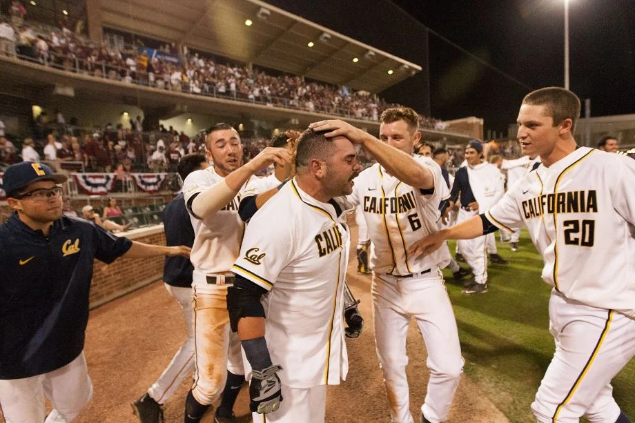 CAL CATCHER AND DE LA SALLE ALUM, MITCHELL "EL GAUCHO" KRANSON CELEBRATES A 14TH INNING WALK-OFF HOMER TO BEAT TEXAS A&M IN THE NCAA TOURNAMENT. (PHOTO BY JUAN DELEON, AP)