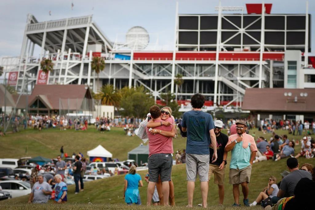 Two Dead Heads embrace outside Levi's Stadium prior to Saturday's Grateful Dead show. (photo by Loren Elliott)