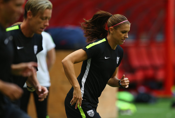 Former CAL Women's soccer star Alex Morgan and Abby Wambach go through a July 4th training session ahead of the USWNT's World Cup Final match vs. Japan. (photo by Ronald Martinez)
