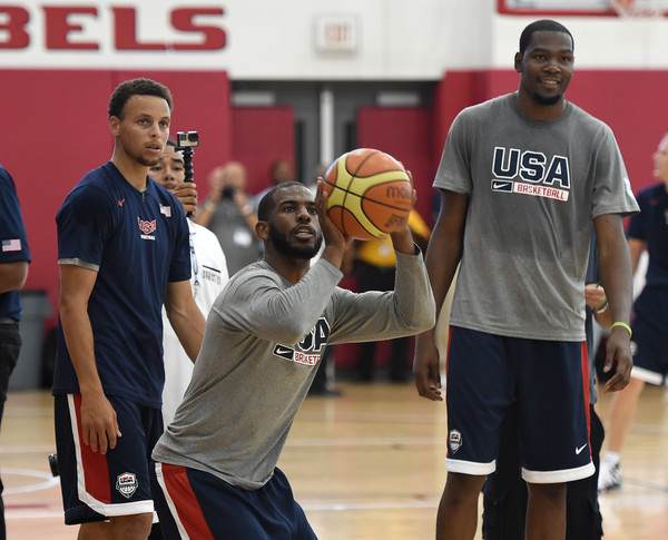 The Baby Faced Assassin and The Durantula discuss the art of the jump shot while playing for Team USA this past summer. (photo by Ethan Miller)