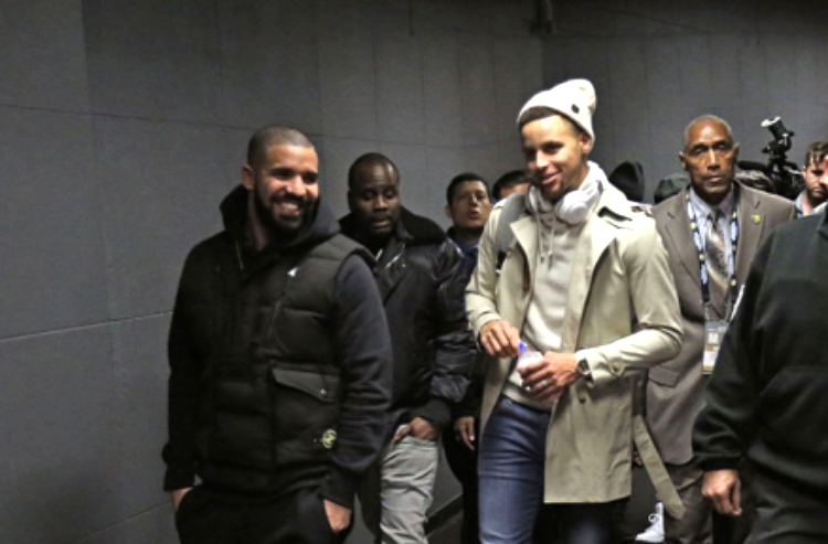 Drake and Steph following last December's Dubs-Raptors game in Toronto (photo by Dave Sanford)