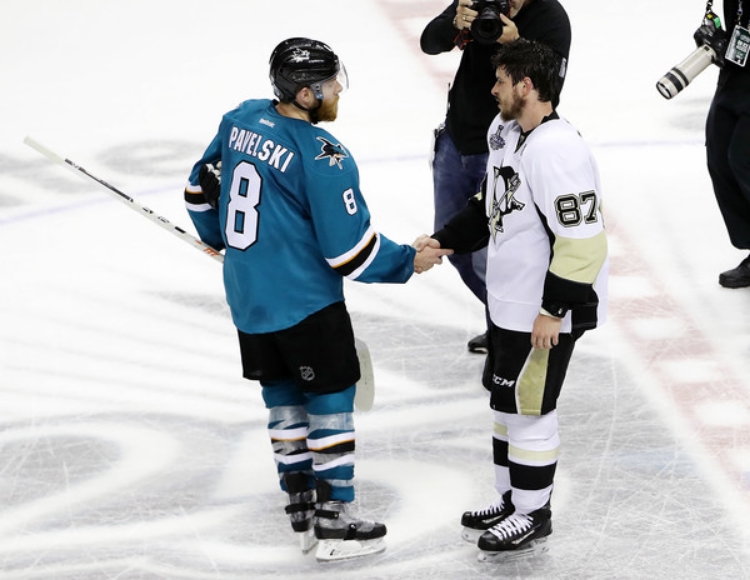Two hockey greats meet at center ice following a hard fought Stanley Cup. (photo by Ezra Shaw)