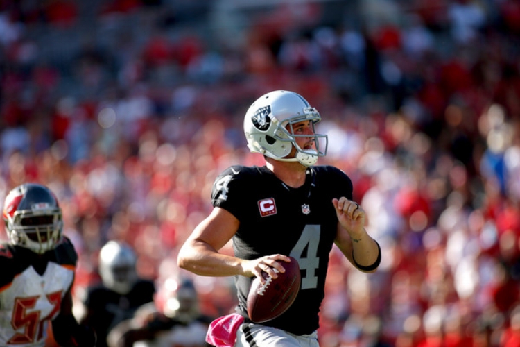Derek Carr had a record setting day for the Silver & Black last Sunday (photo by Brian Blanco)