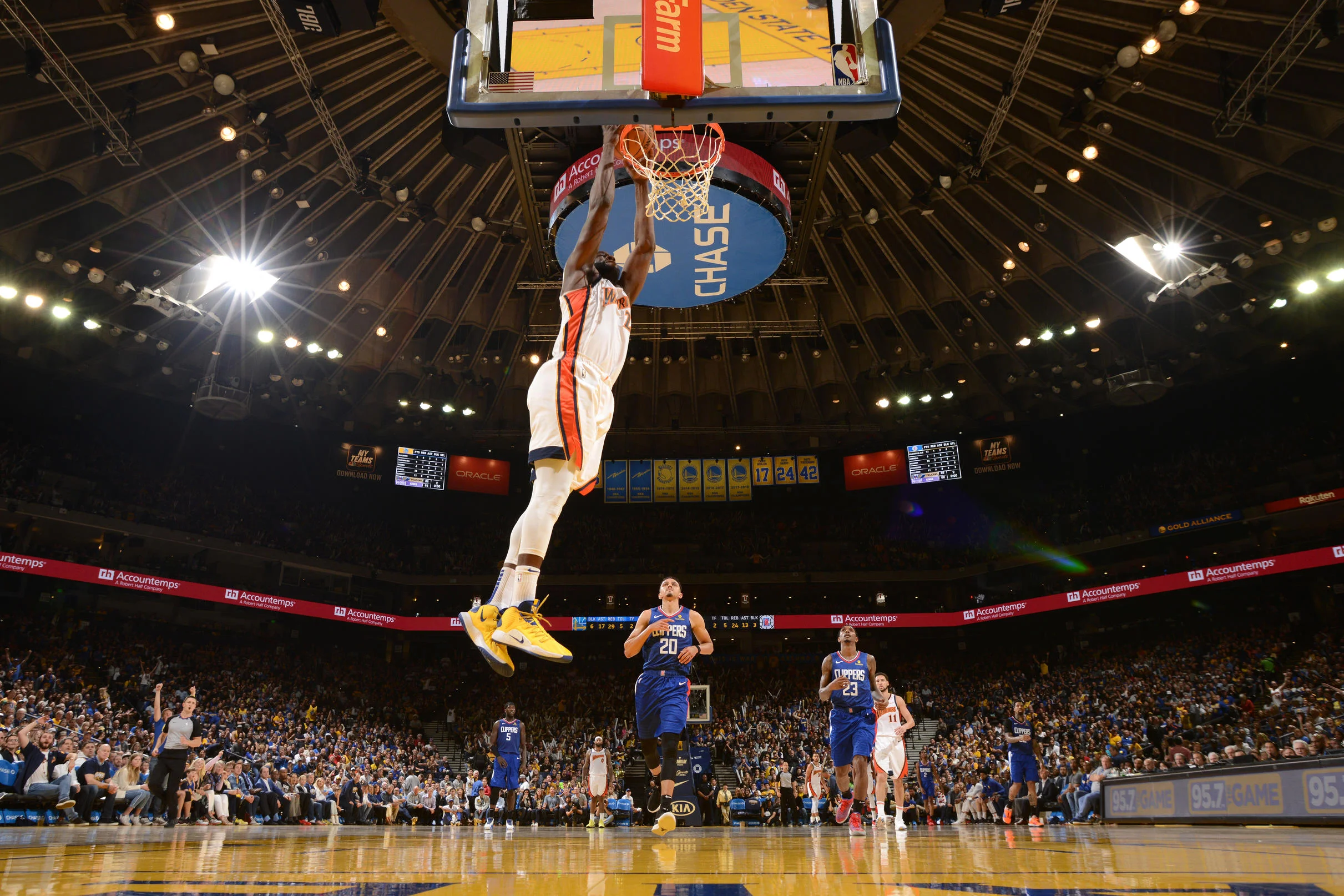 Draymond skies under the signature Coliseum ceiling. (Photo by Noah Graham)